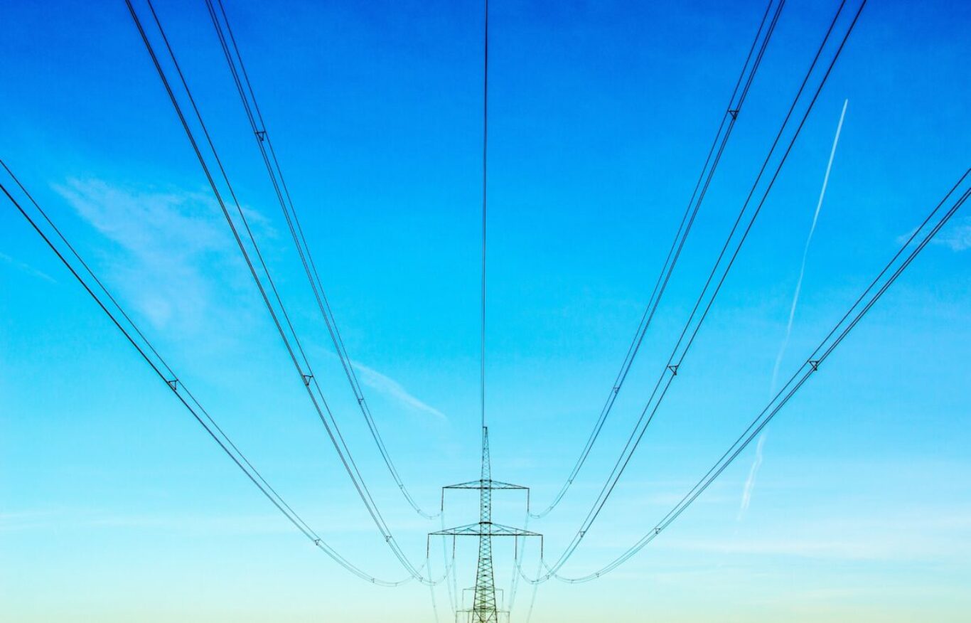 Electricity,Pylon,At,Sunshine,And,Blue,Skies