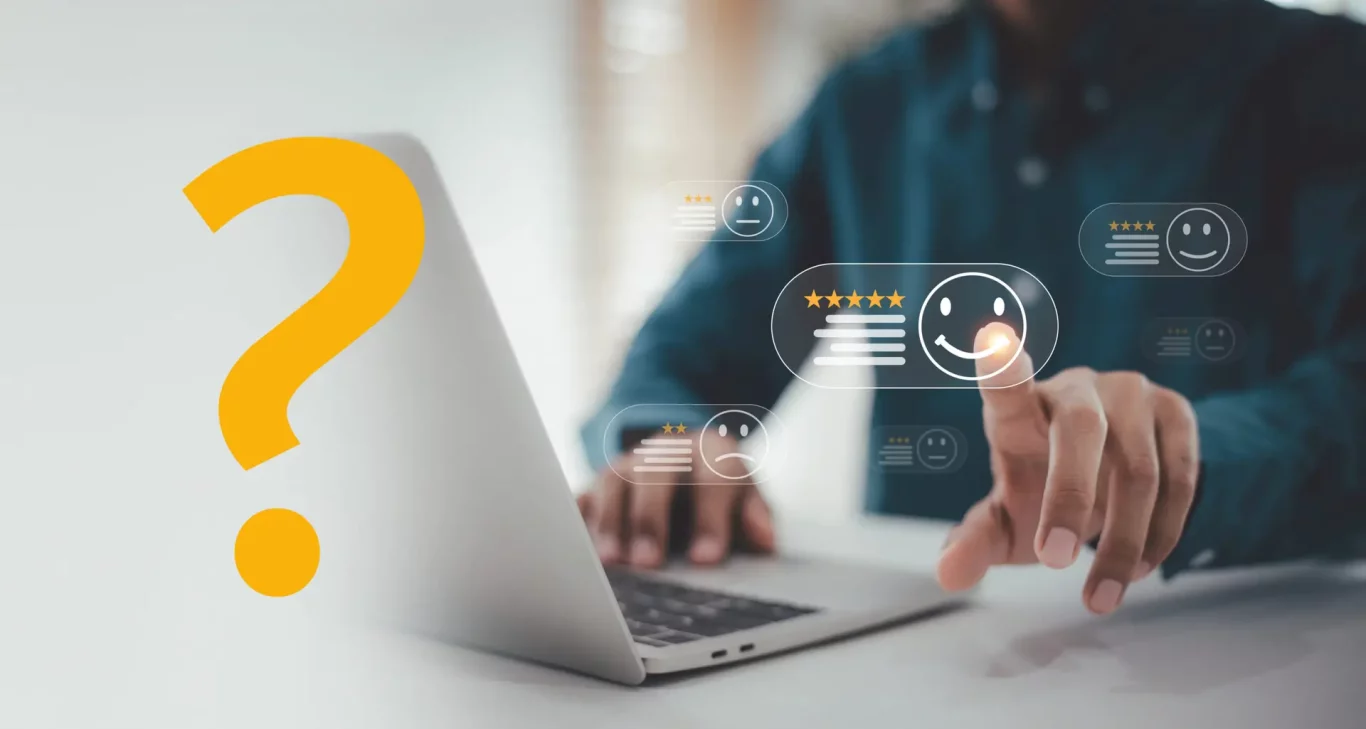 Business Evaluation and Positive Review , Man is using a laptop, pointing at a virtual happy face and five-star rating icon on a customer satisfaction survey interface.