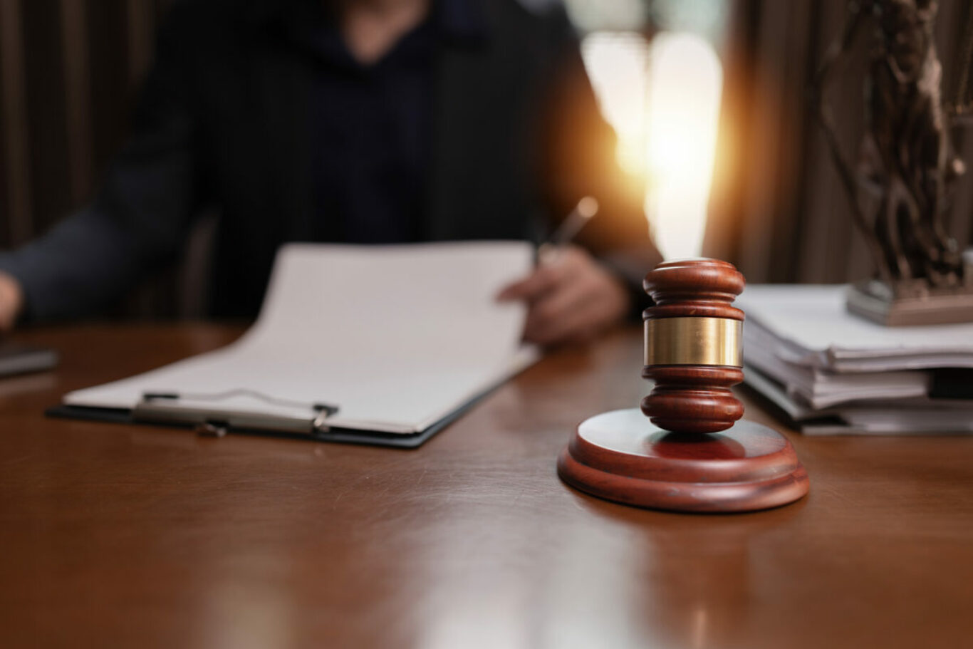 Lawyer Businesswoman Working with Documents and Signing Contract